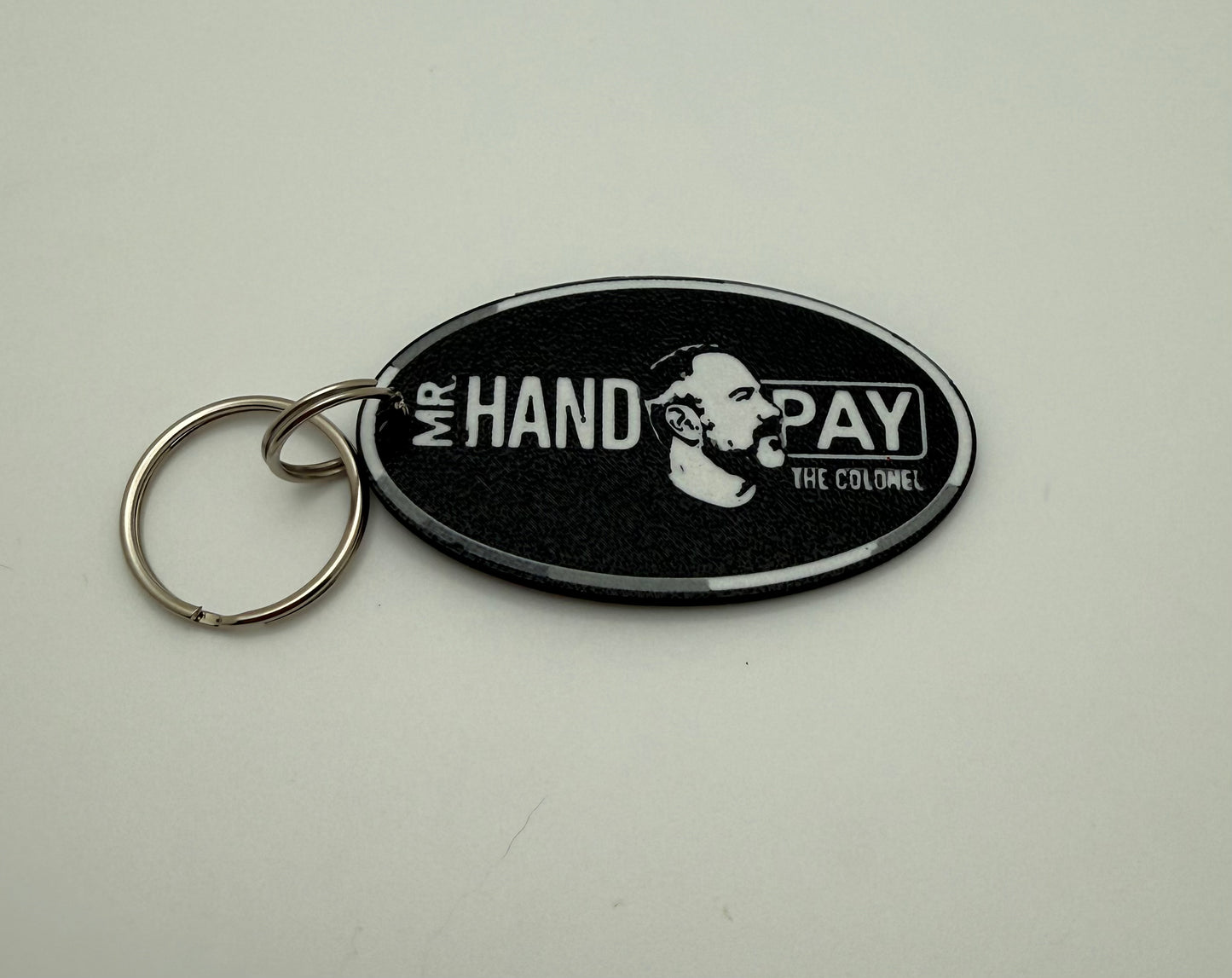 The Colonel Mr Hand Pay Keychain
